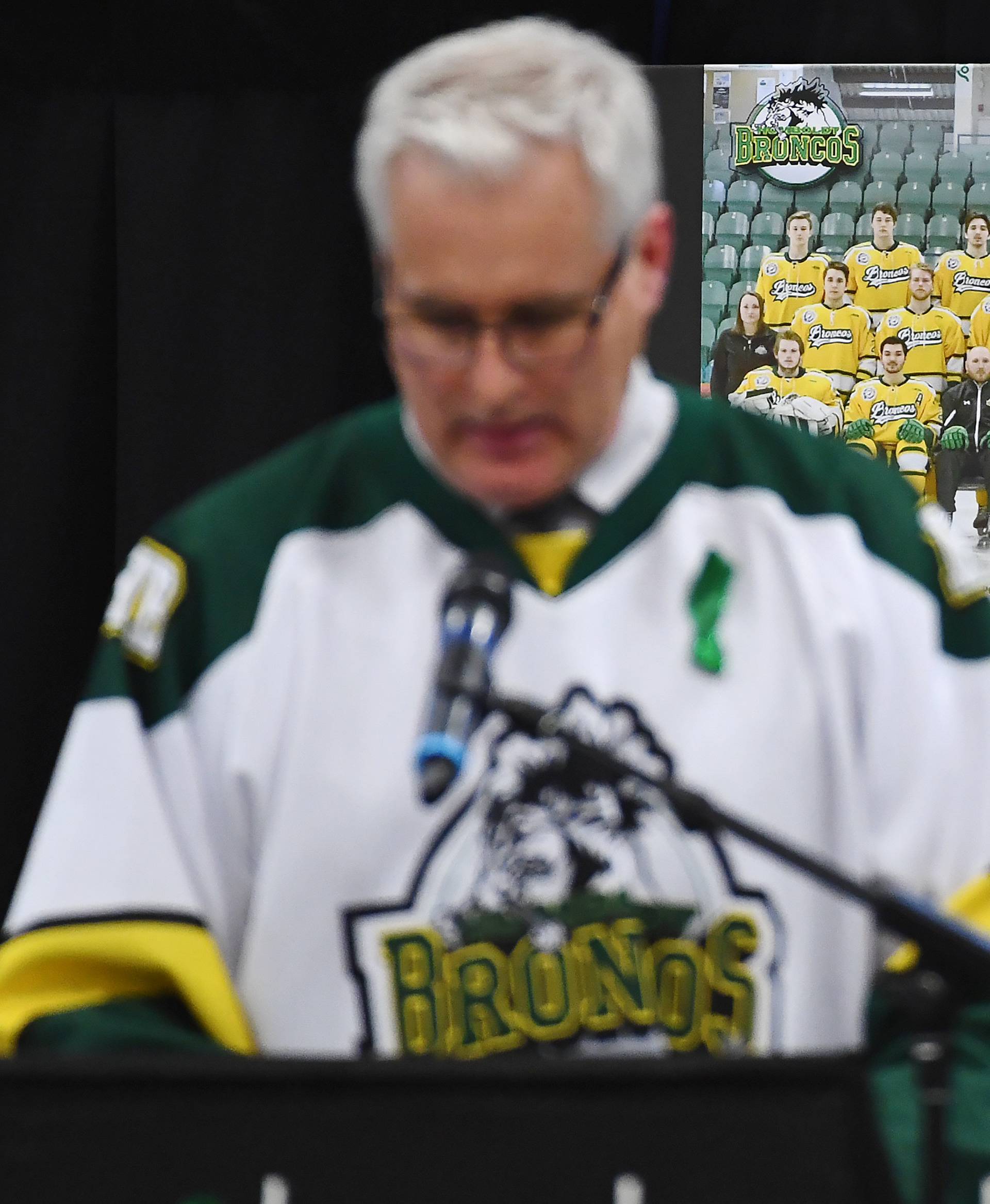 Humboldt Mayor Rob Muench speaks on stage during a vigil at the Elgar Petersen Arena, home of the Humboldt Broncos, to honour the victims of a fatal bus accident in Humboldt