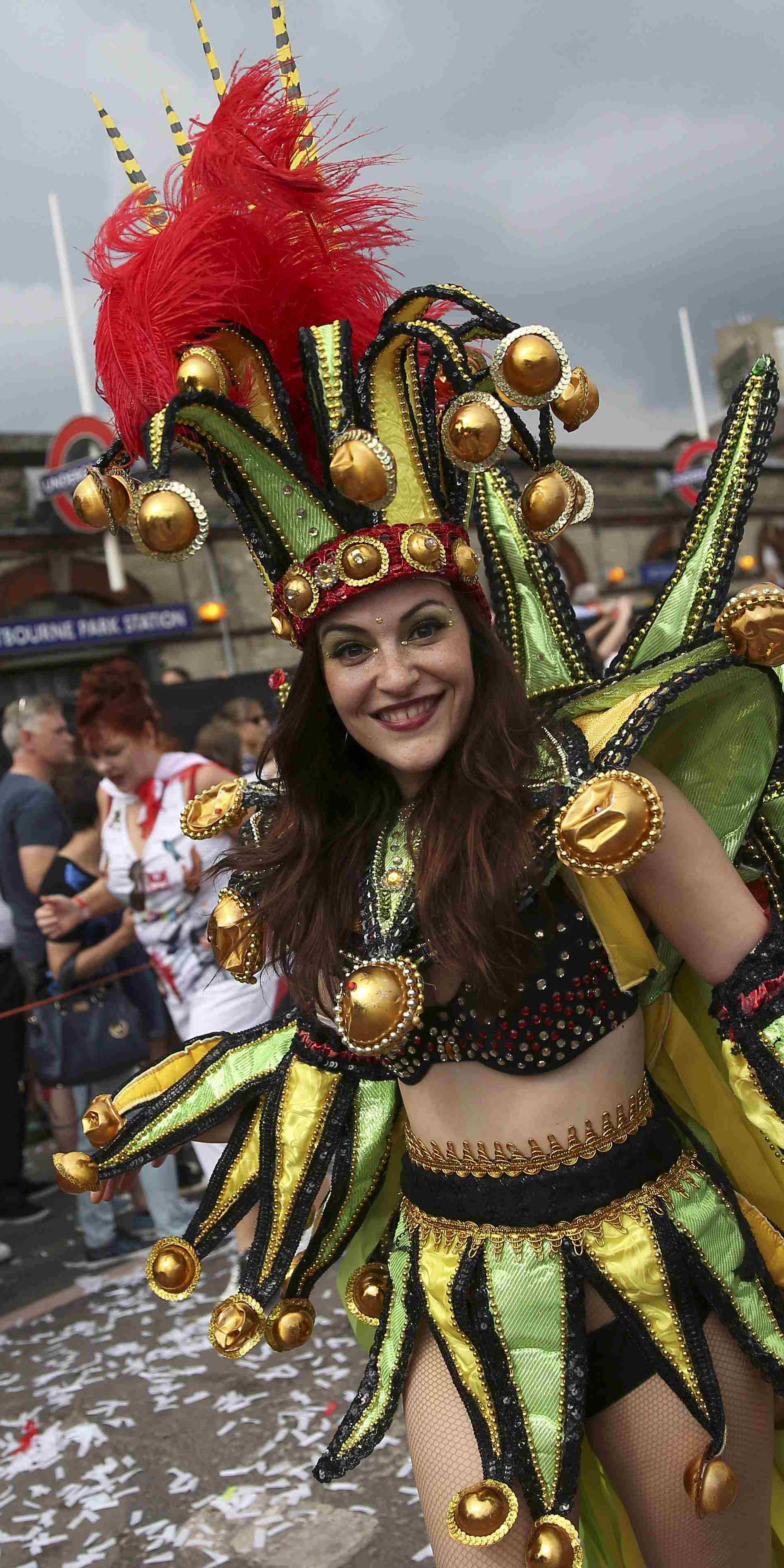 Performers participate in the parade at the Notting Hill Carnival in London