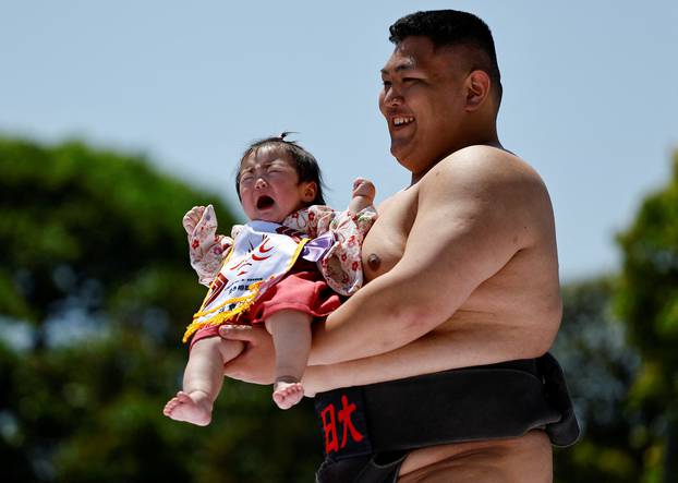 Babies take part in 'Nakizumo' or baby crying sumo contest at Sensoji temple in Tokyo