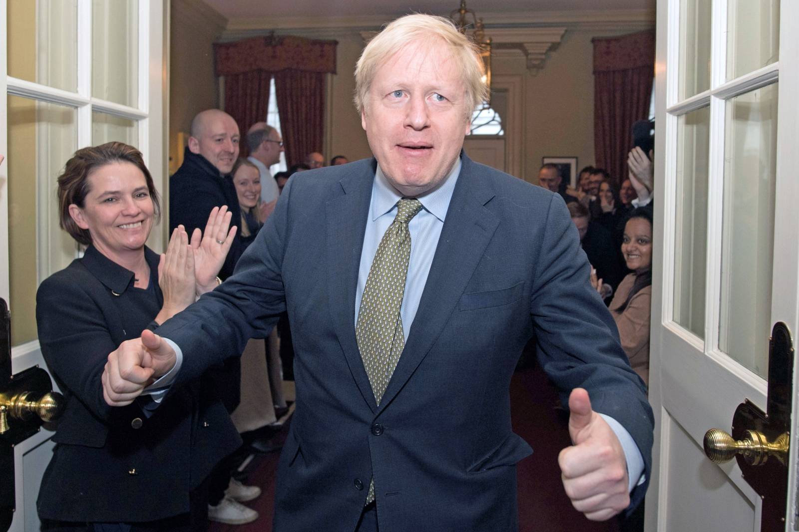 Britain's PM Johnson returns to Downing Street, London