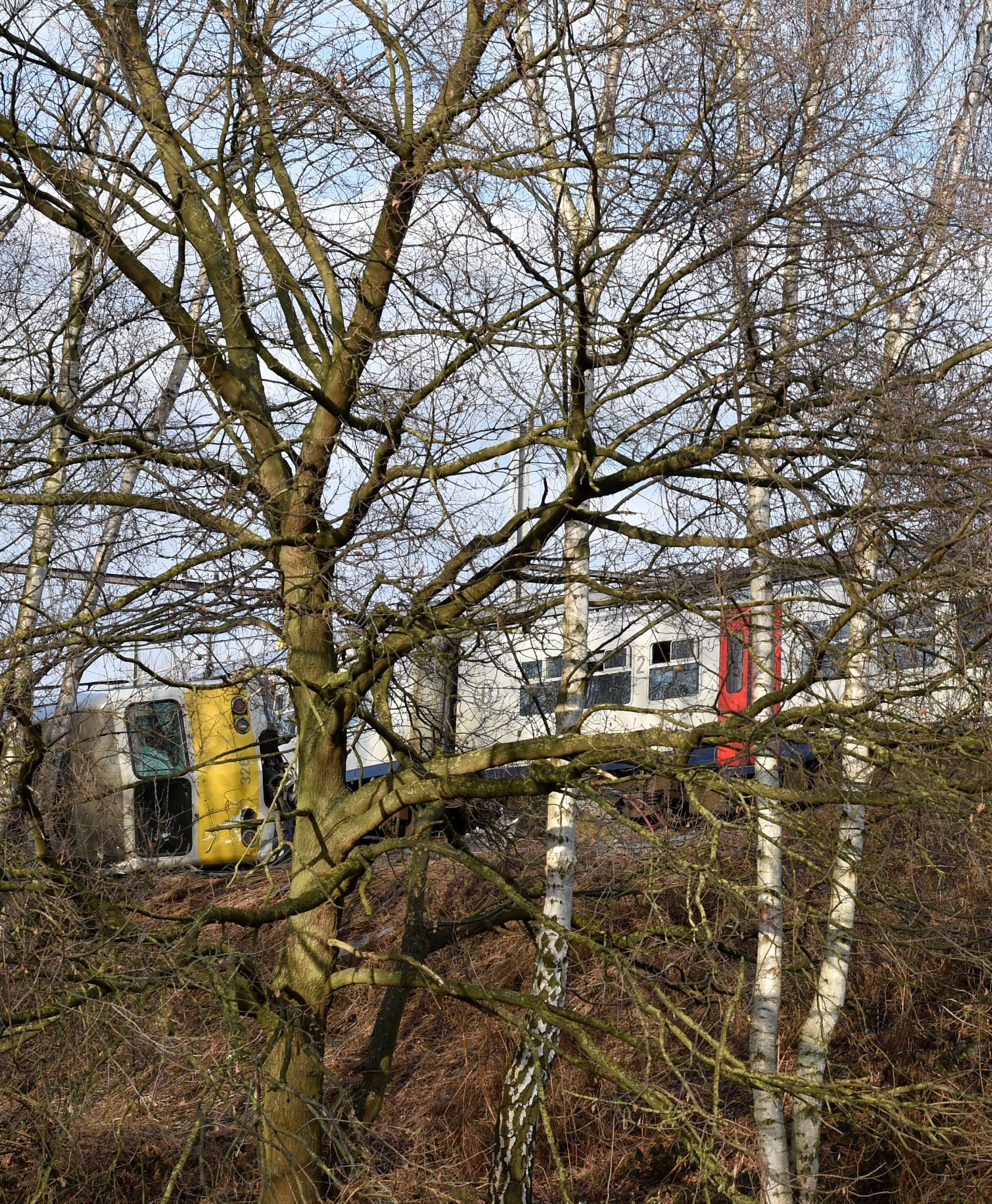 The wreckage of a passenger train is seen after it derailed in Kessel-Lo near Leuven