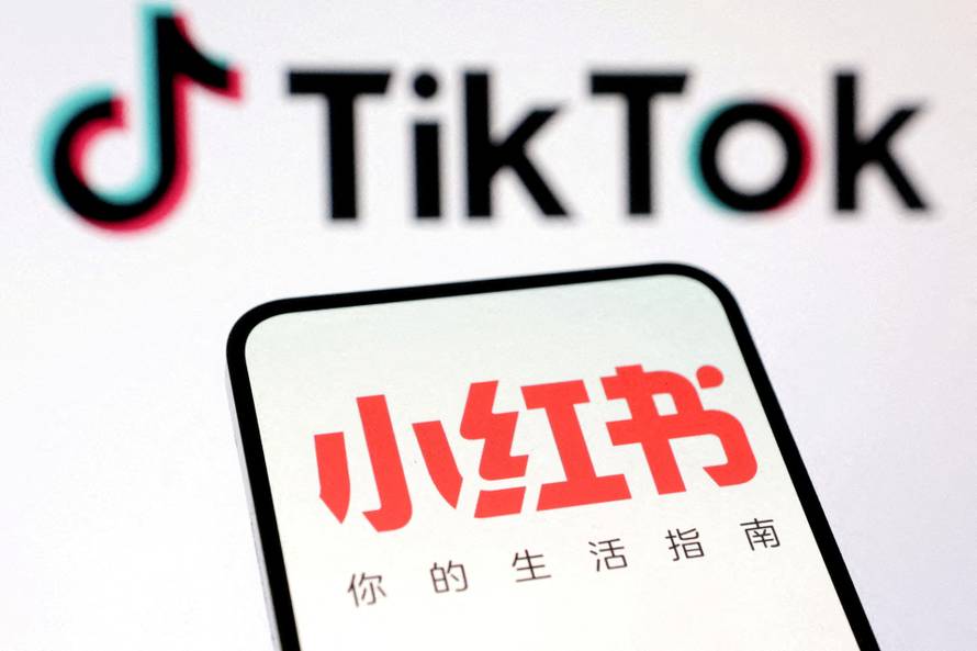 FILE PHOTO: Illustration shows TikTok and RedNote logos