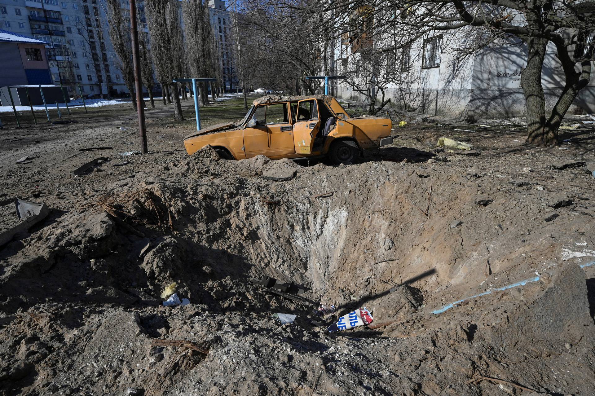 Shell crater in seen at a residential area in Sievierodonetsk