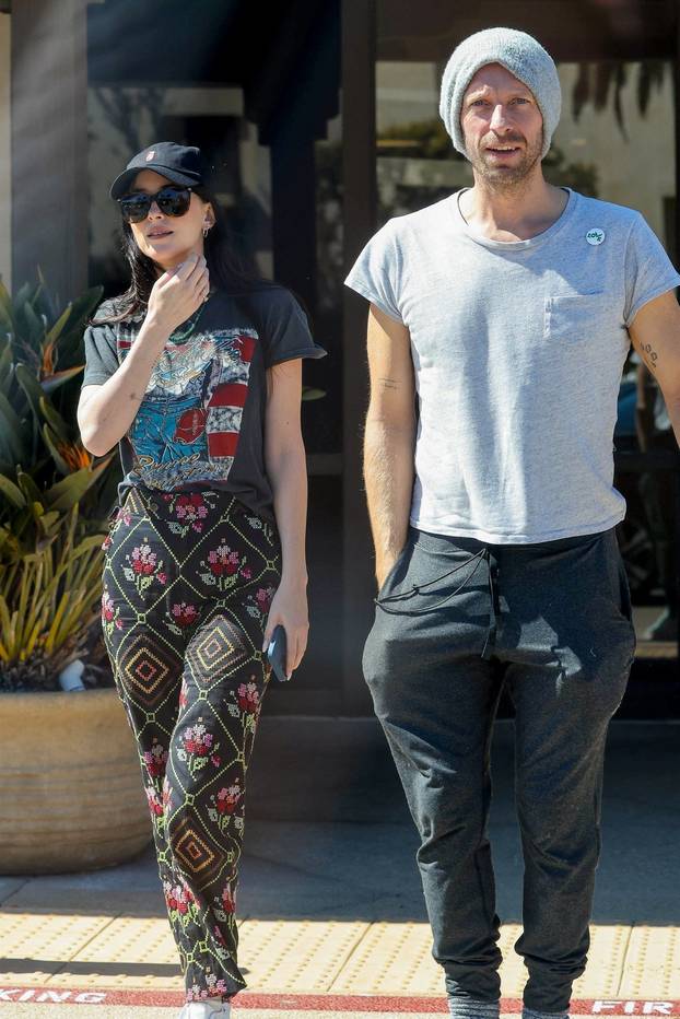 *EXCLUSIVE* Chris Martin and Dakota Johnson share a laugh on a coffee run together in Malibu