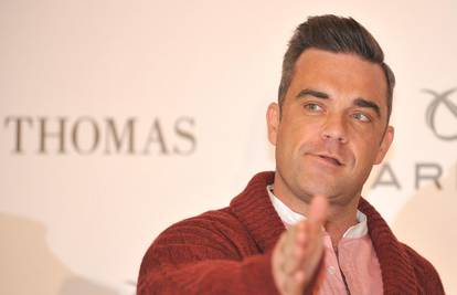 Robbie Williams pao s bine pa je slomio ruku obožavateljici