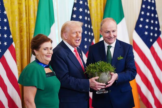 Taoiseach Martin of Ireland Presents Traditional Shamrocks to US President Trump