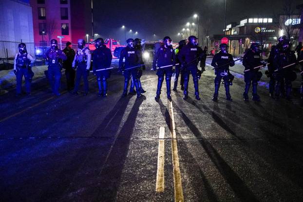 Protest outside the hotel where Bovino, who has been removed from his role, is reportedly staying, in Maple Grove