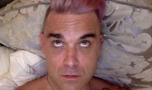 Robbie Williams: Moja kosa se transformira kao Bruce Jenner