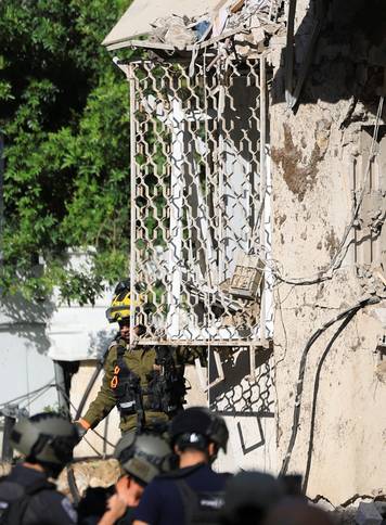 Aftermath of Iranian missile barrages in central Israel