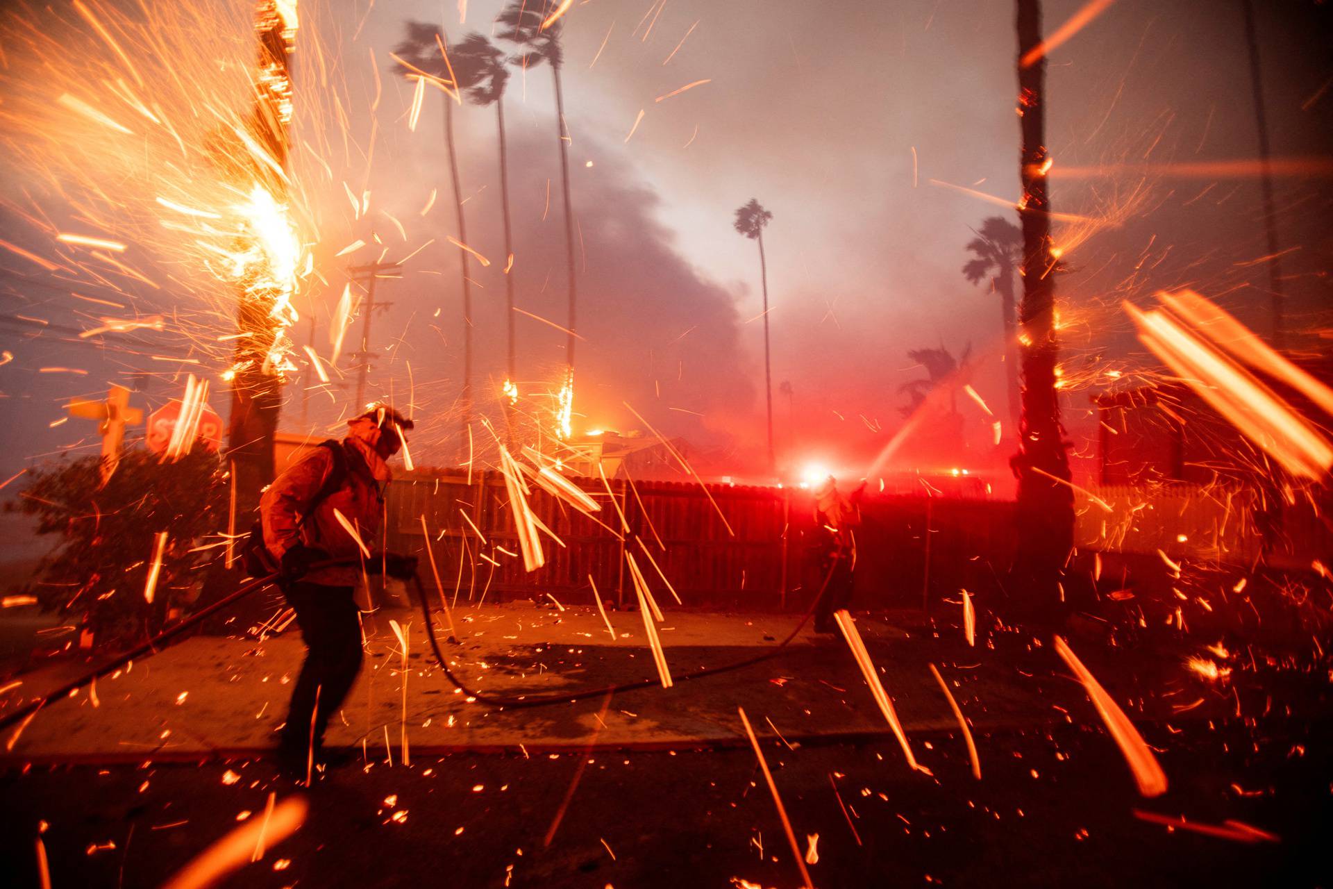 Palisades Fire burns during a windstorm on the west side of Los Angeles