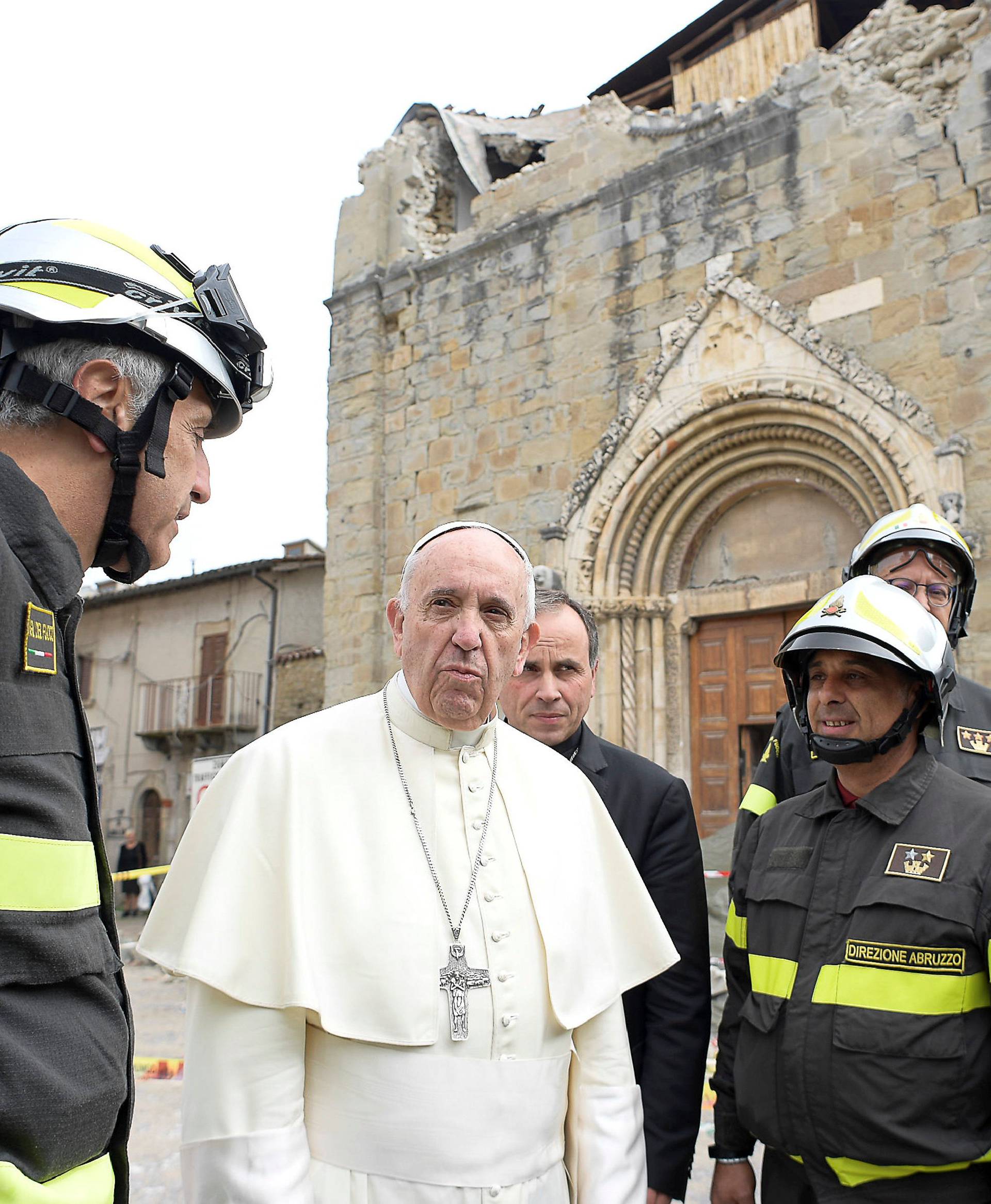 Pope Francis talks with firefighters in Amatrice