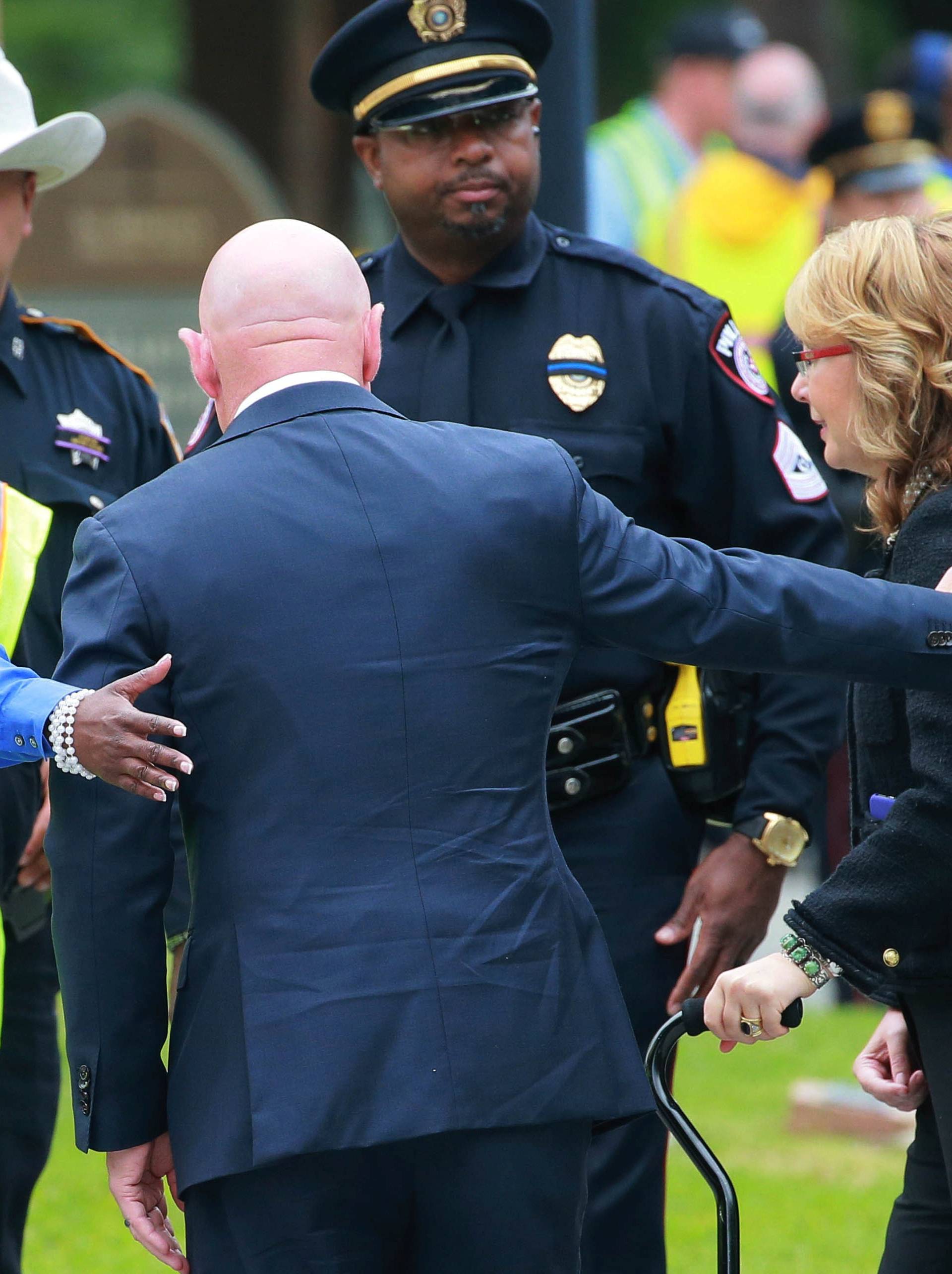 Former U.S. Congresswoman Giffords and husband Astronaut Kelly arrive at Barbara Bush funeral in Houston