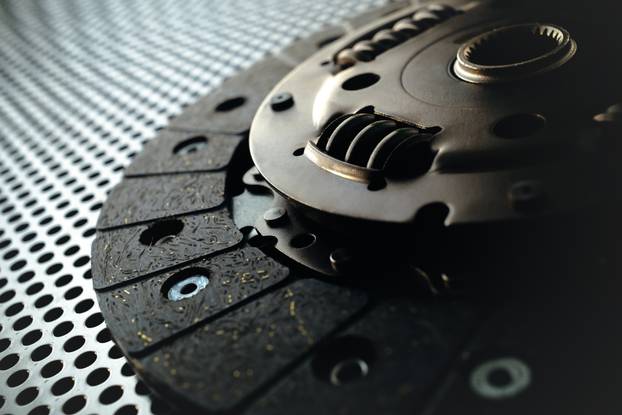 Car,Clutch,On,A,Metal,Surface.,Photo,From,The,Classical