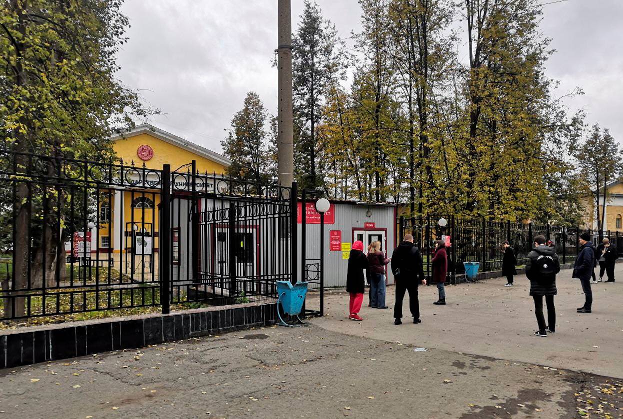 People gather outside Perm State University following a shooting, in Perm