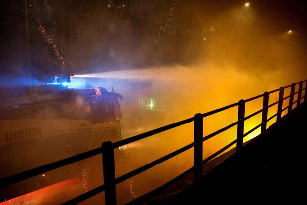 Demonstrators protest the 2026 Winter Olympics in Milan