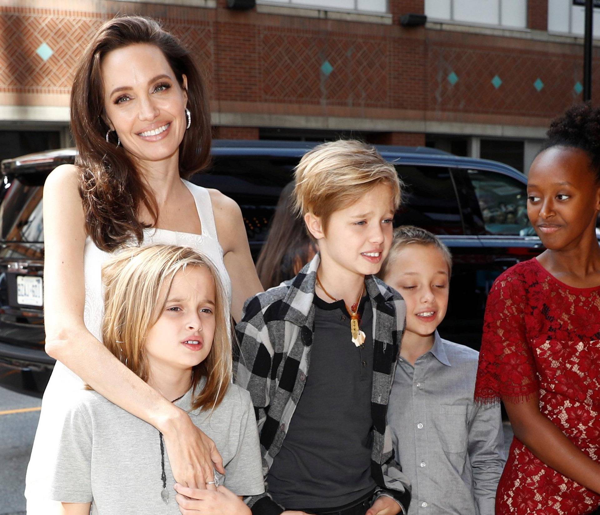Jolie arrives on the red carpet with her children for the film "The Breadwinner" during the Toronto International Film Festival in Toronto