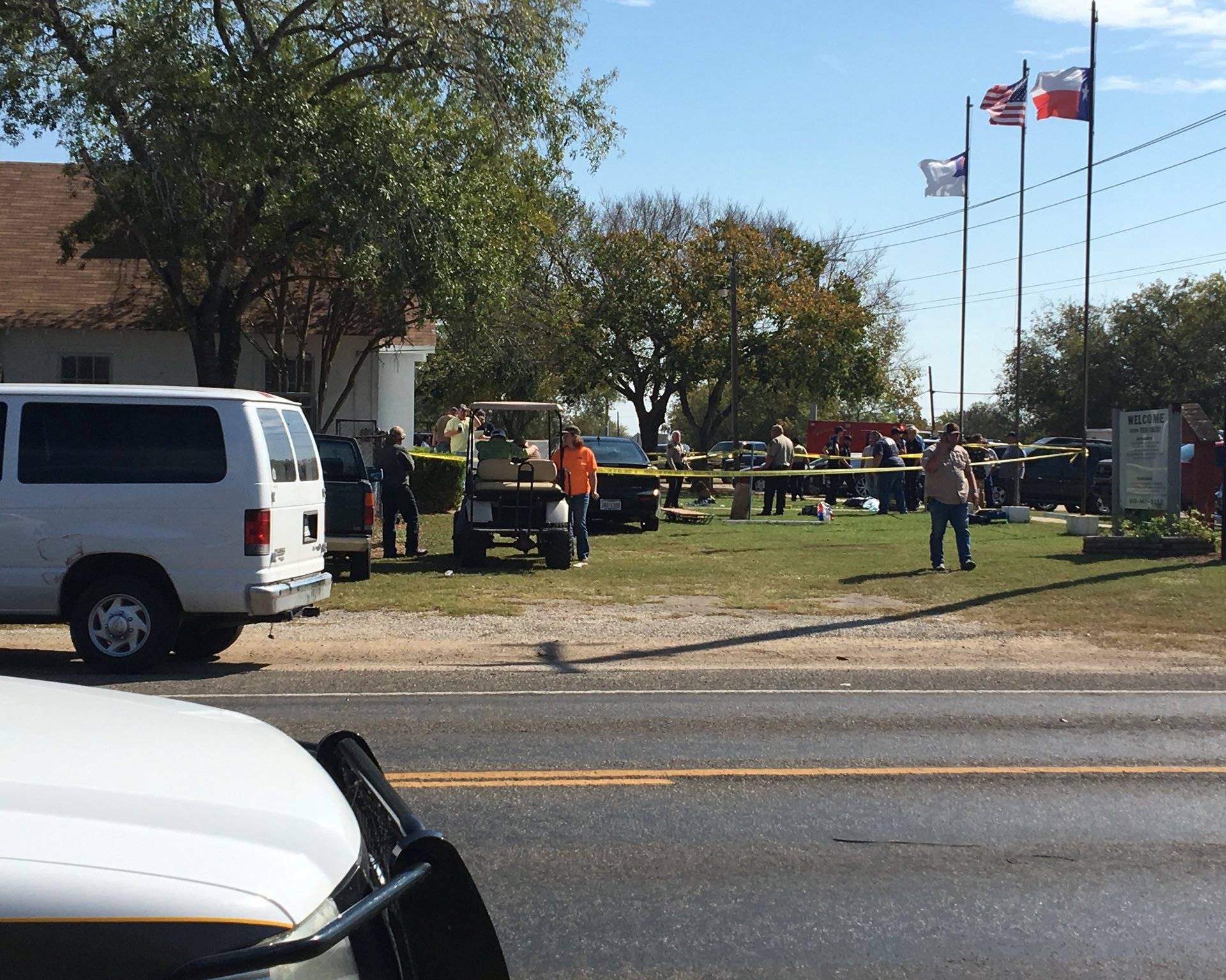 The area around a site of a mass shooting is taped off in Sutherland Springs