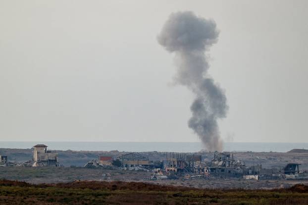 Smoke rises from Gaza following an Israeli airstrike