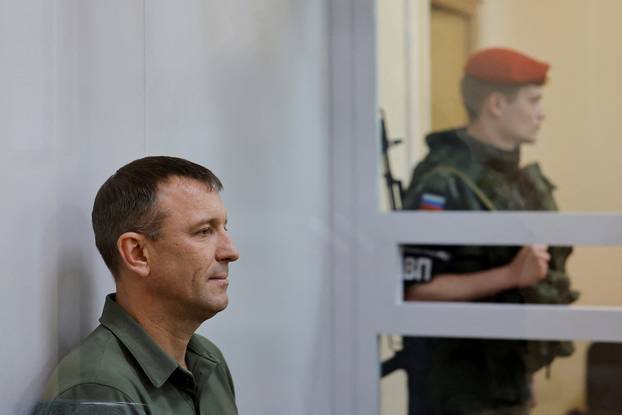 FILE PHOTO: Major General Ivan Popov, arrested on suspicion of fraud, attends a hearing at the military court in Moscow