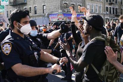 Protesters rally against the death in Minneapolis police custody of Floyd, in the Brooklyn borough of New York City