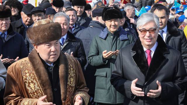 Former Kazakh President Nazarbayev and President Tokayev visit a fair of Navruz festival in Astana