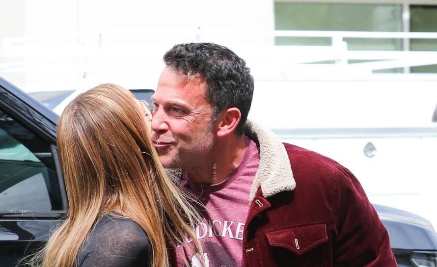 *EXCLUSIVE* Jennifer Lopez and Ben Affleck share a smooch while arriving at the YMCA in Santa Monica! - ** WEB MUST CALL FOR PRICING **