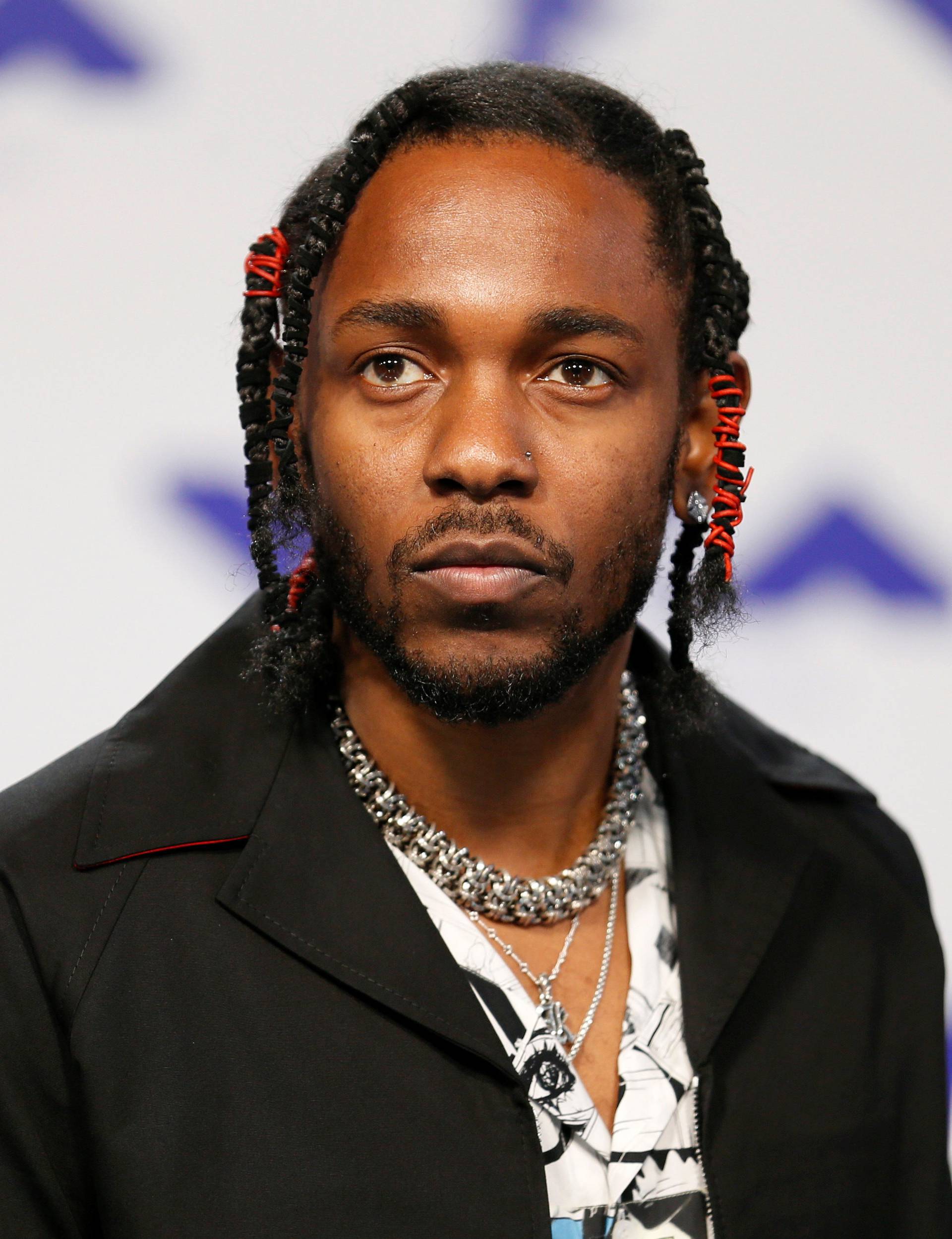 FILE PHOTO: Musician Kendrick Lamar arrives at the 2017 MTV Video Music Awards in Inglewood