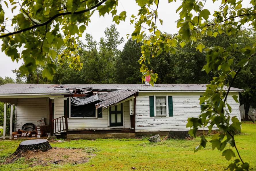 The roof of a house is seen affected by winds from Hurricane Florence as it hits the town of Wilson, North Carolina
