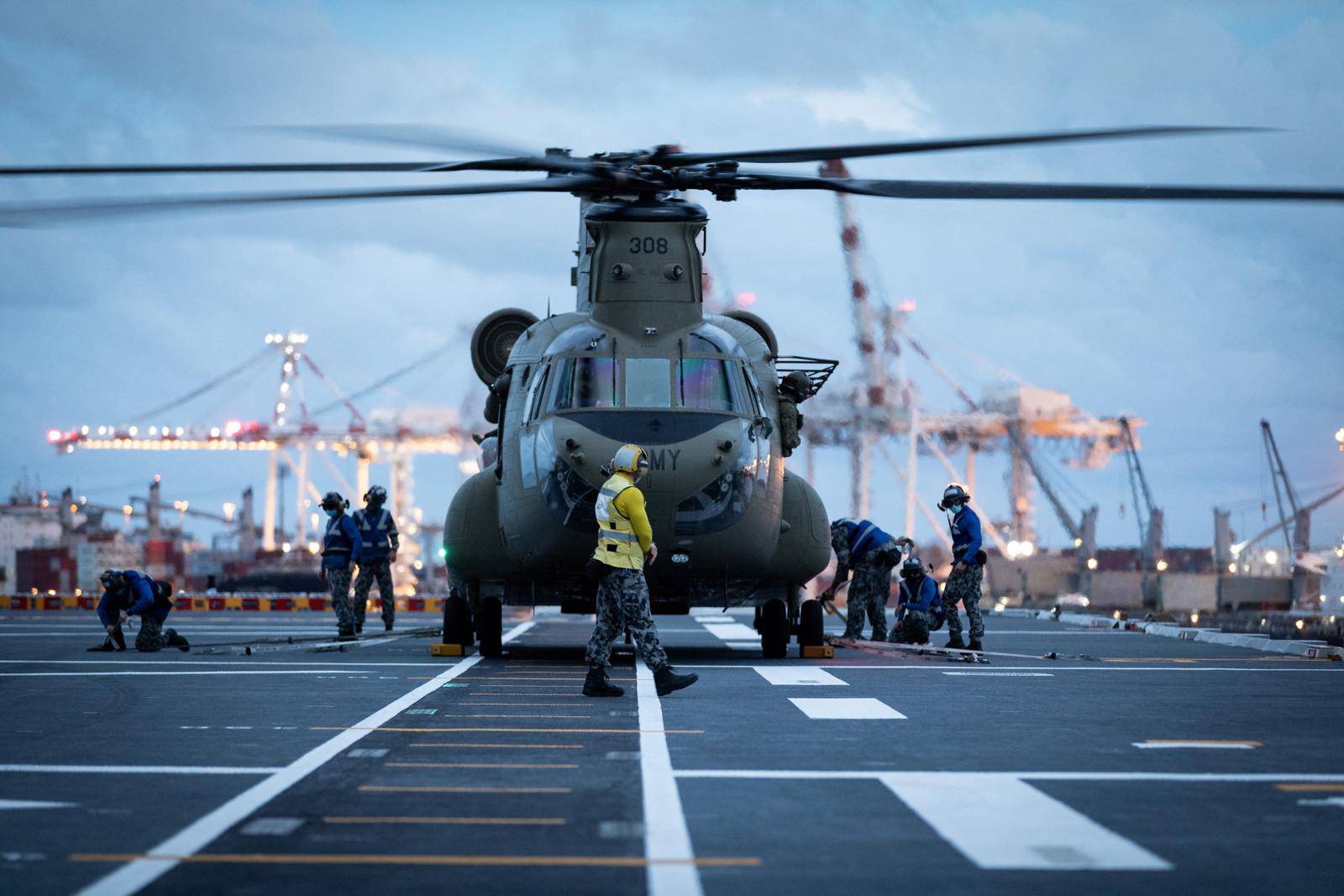 HMAS Adelaide embarks Australian Army CH-47 Chinook before leaving for Tonga