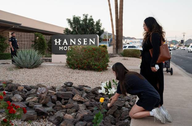 Makeshift memorial outside the mortuary where the body of slain conservative activist Charlie Kirk was delivered, in Phoenix