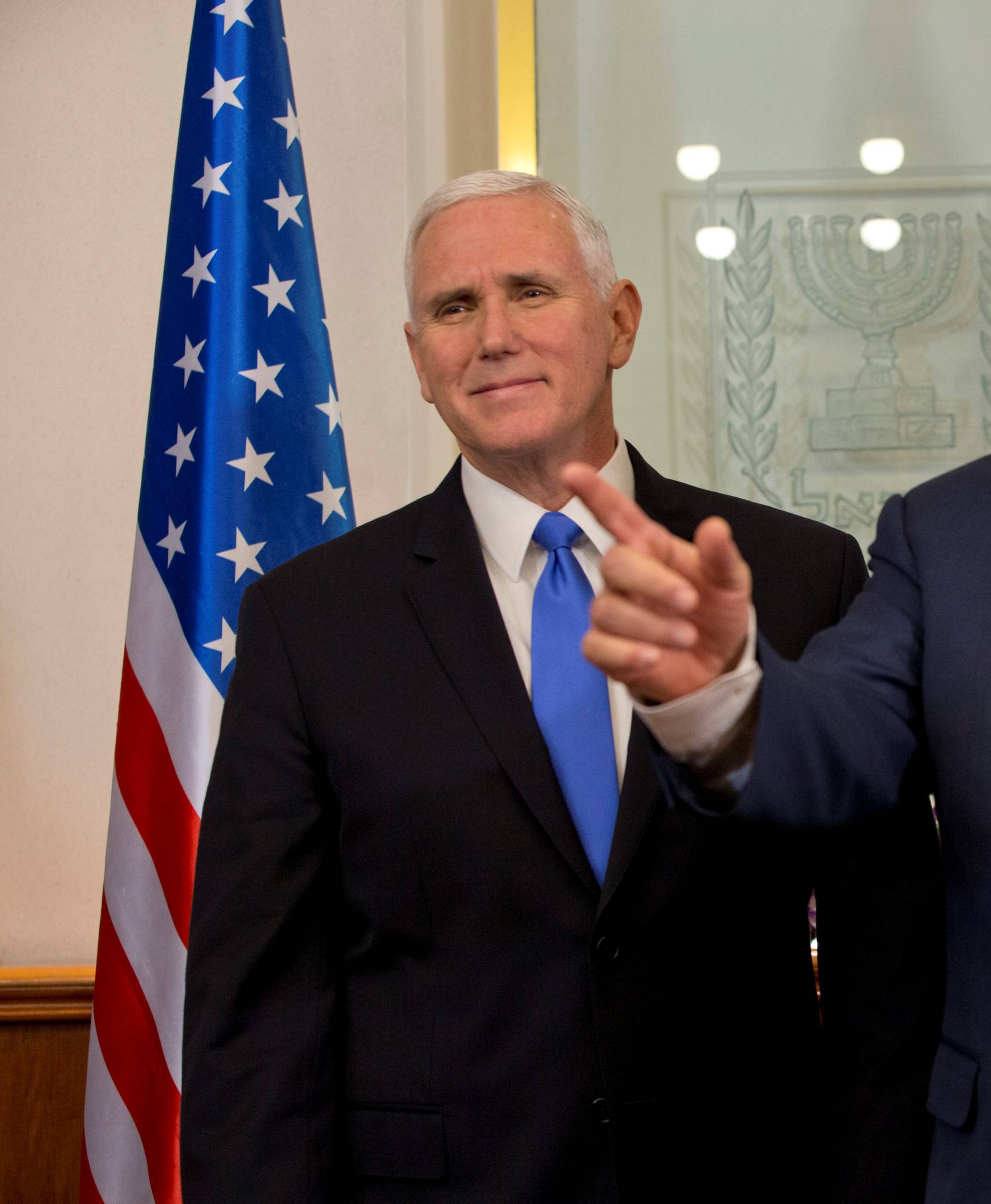 U.S. Vice President Mike Pence stands next to Israeli Prime Minister Benjamin Netanyahu during a meeting at the Prime Minister's office in Jerusalem