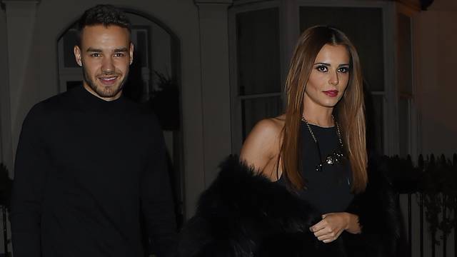 Cheryl Fernandez- Versini and Liam Payne hold hands on date night.