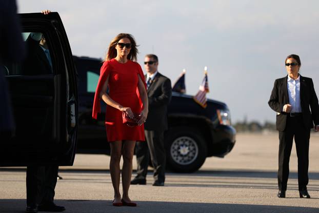 First Lady Melania Trump welcomes U.S. President Donald Trump as he arrives at West Palm Beach International airport in West Palm Beach, Florida, U.S