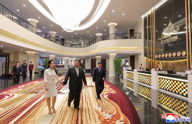 North Korean leader Kim Jong Un and his daughter Kim Ju Ae attend a ceremony to celebrate the completion of the Wonsan Kalma Coastal Tourist Zone