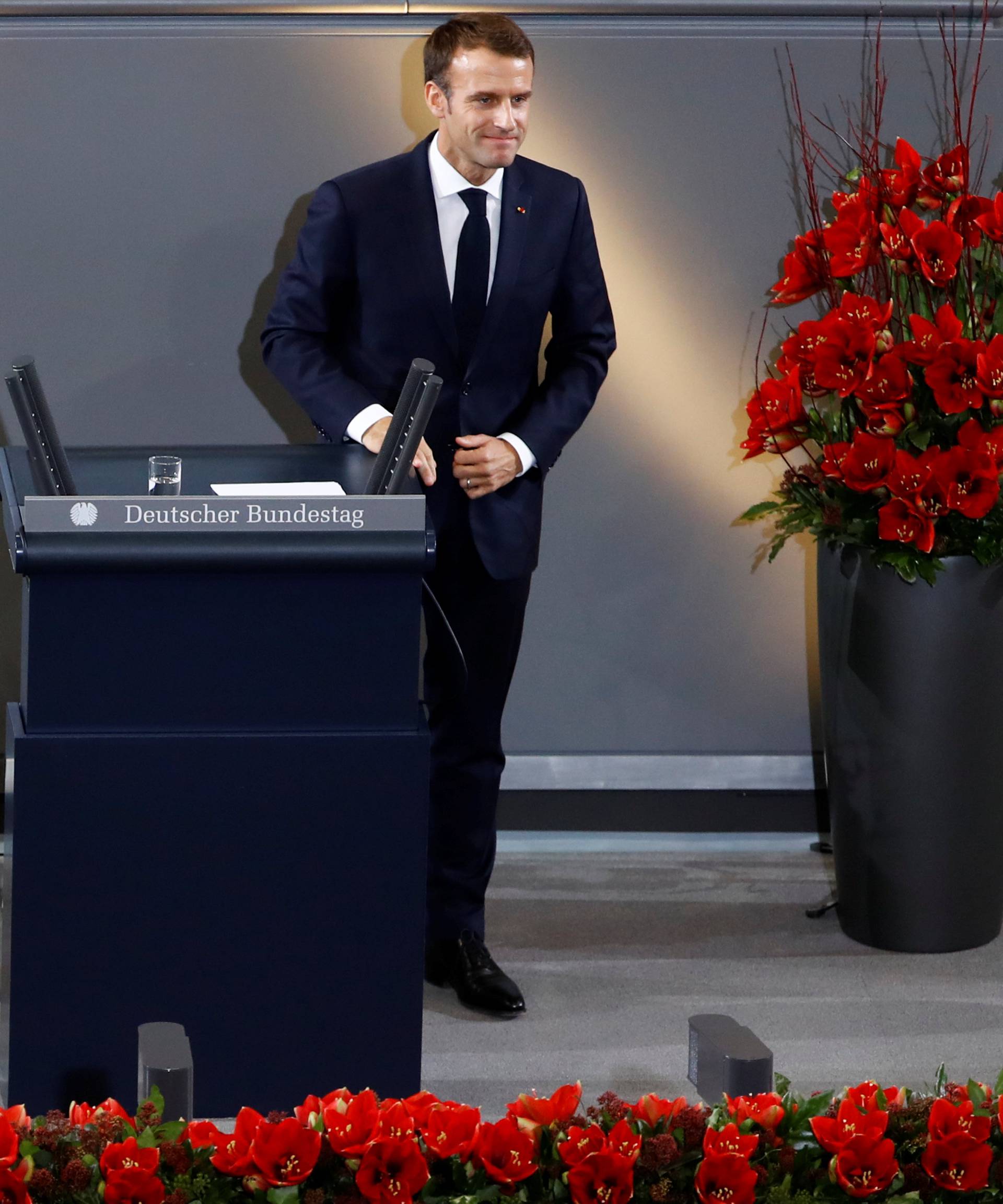 French President Emmanuel Macron is seen after giving a speech during a ceremony at the lower house of parliament Bundestag in the Reichstag building in Berlin to mark National Mourning Day