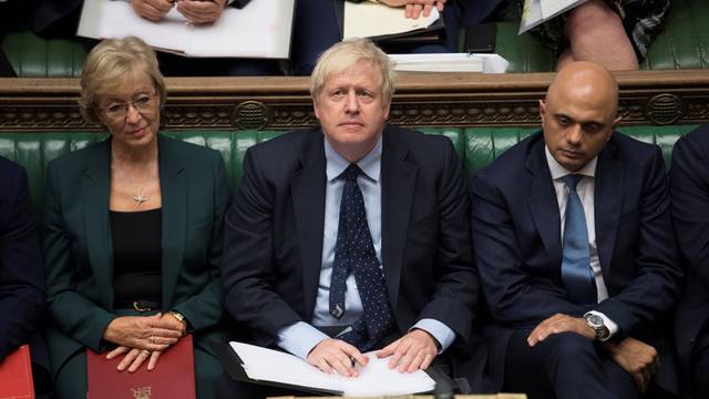 Britain's Prime Minister Boris Johnson looks on at the House of Commons in London