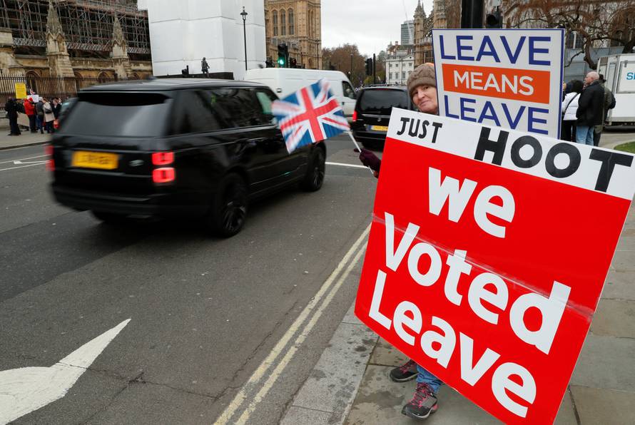 A pro-Brexit protester demonstrates outside the Houses of Parliament in London