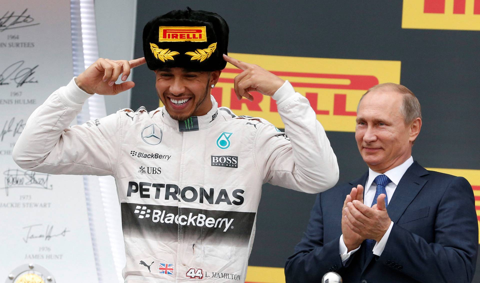 FILE PHOTO: Russian President Putin watches Mercedes' Hamilton celebrates after winning Russian F1 Grand Prix in Sochi