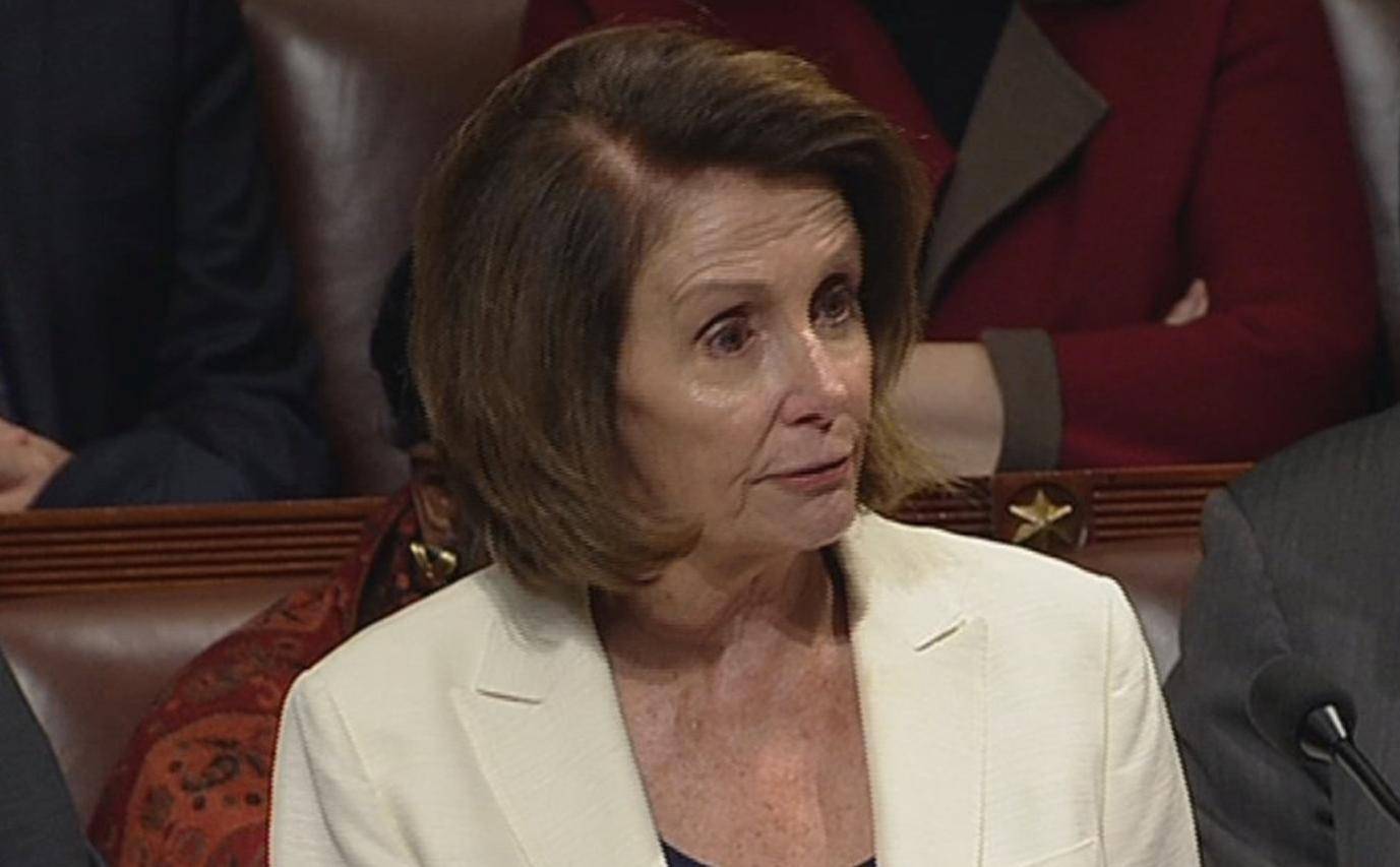 Video grab shows U.S. House Minority Leader Pelosi reading from bible during marathon speech on the floor of the House of Representatives on Capitol Hill in Washington