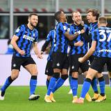 Soccer Football - Coppa Italia - Quarter Final - Inter Milan v AC Milan - San Siro, Milan, Italy - January 26, 2021 Inter Milan's Christian Eriksen celebrates scoring their second goal with teammates REUTERS/Daniele Mascolo