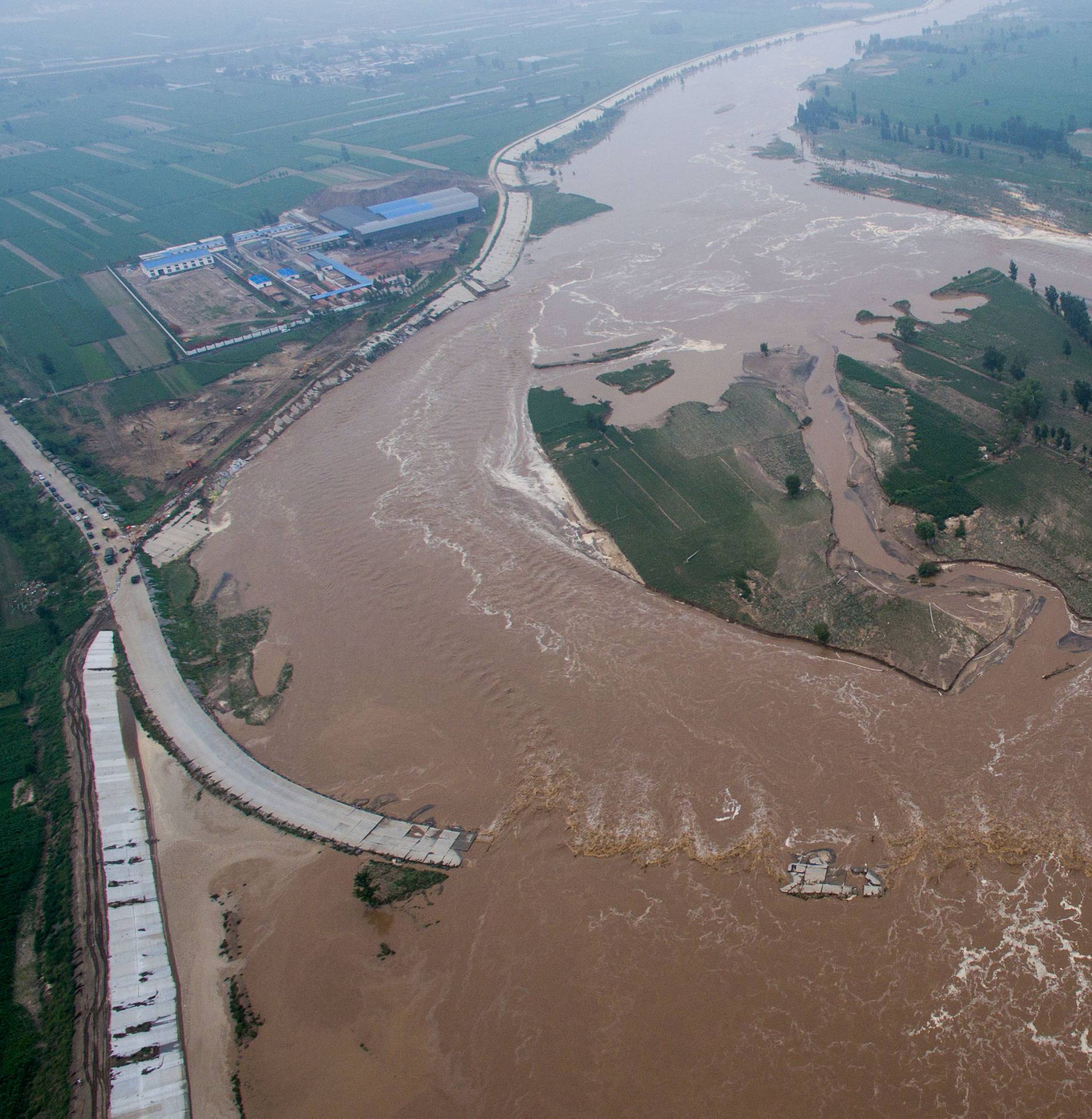 An aerial view shows that roads and fields are flooded in Xingtai