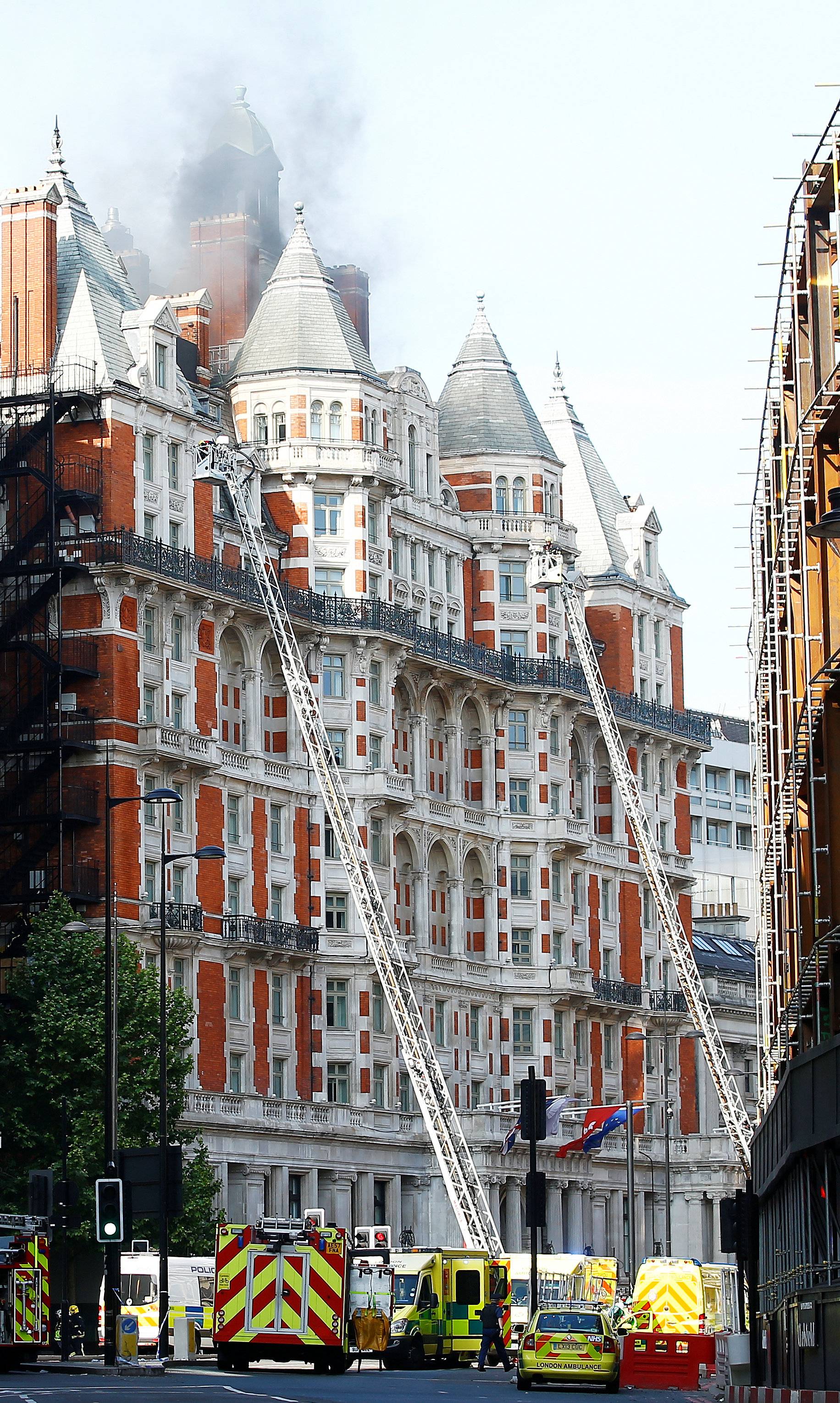 Firefighters tackle a blaze at the Mandarin Oriental Hotel in Knightsbridge, central London