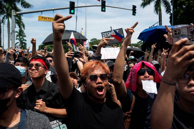 Filipinos gather during a protest denouncing what they call corruption linked to flood control projects