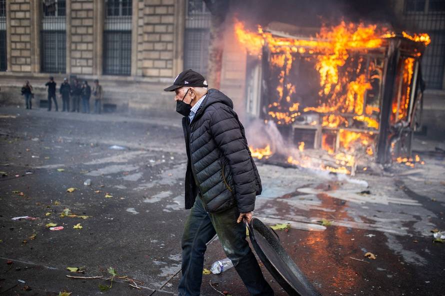 Police clash with protesters during demonstration in Paris