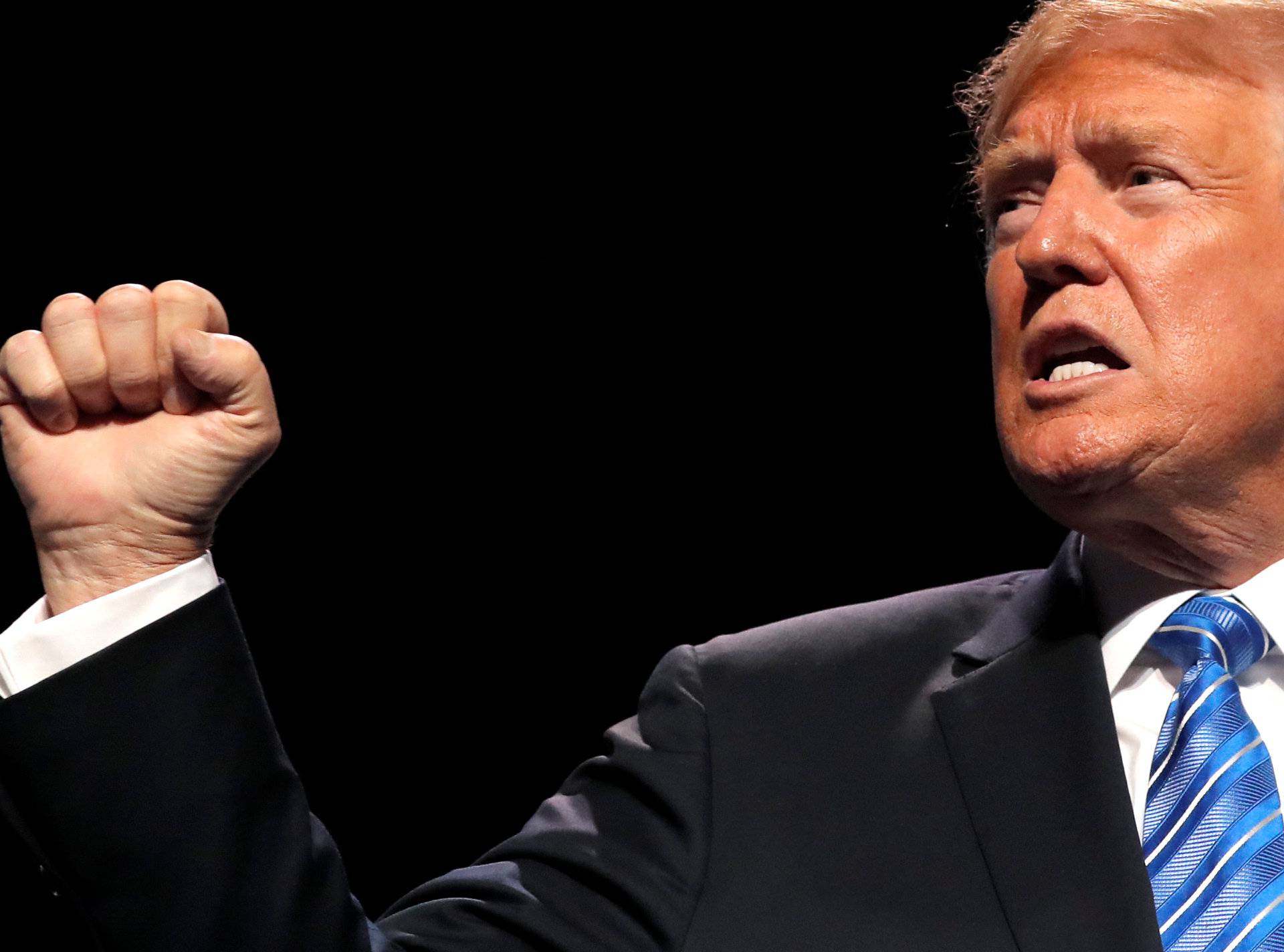 U.S. President Donald Trump gestures as he addresses the Veterans of Foreign Warsâ 119th VFW national convention in Kansas City