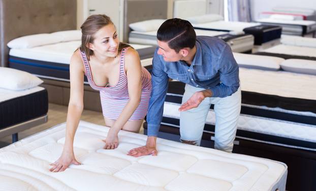 Happy,Couple,Choosing,Mattresses,In,The,Store