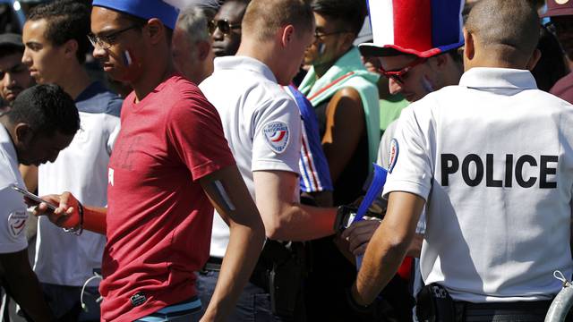 Security check near the Paris fan zone during a EURO 2016 final soccer match       