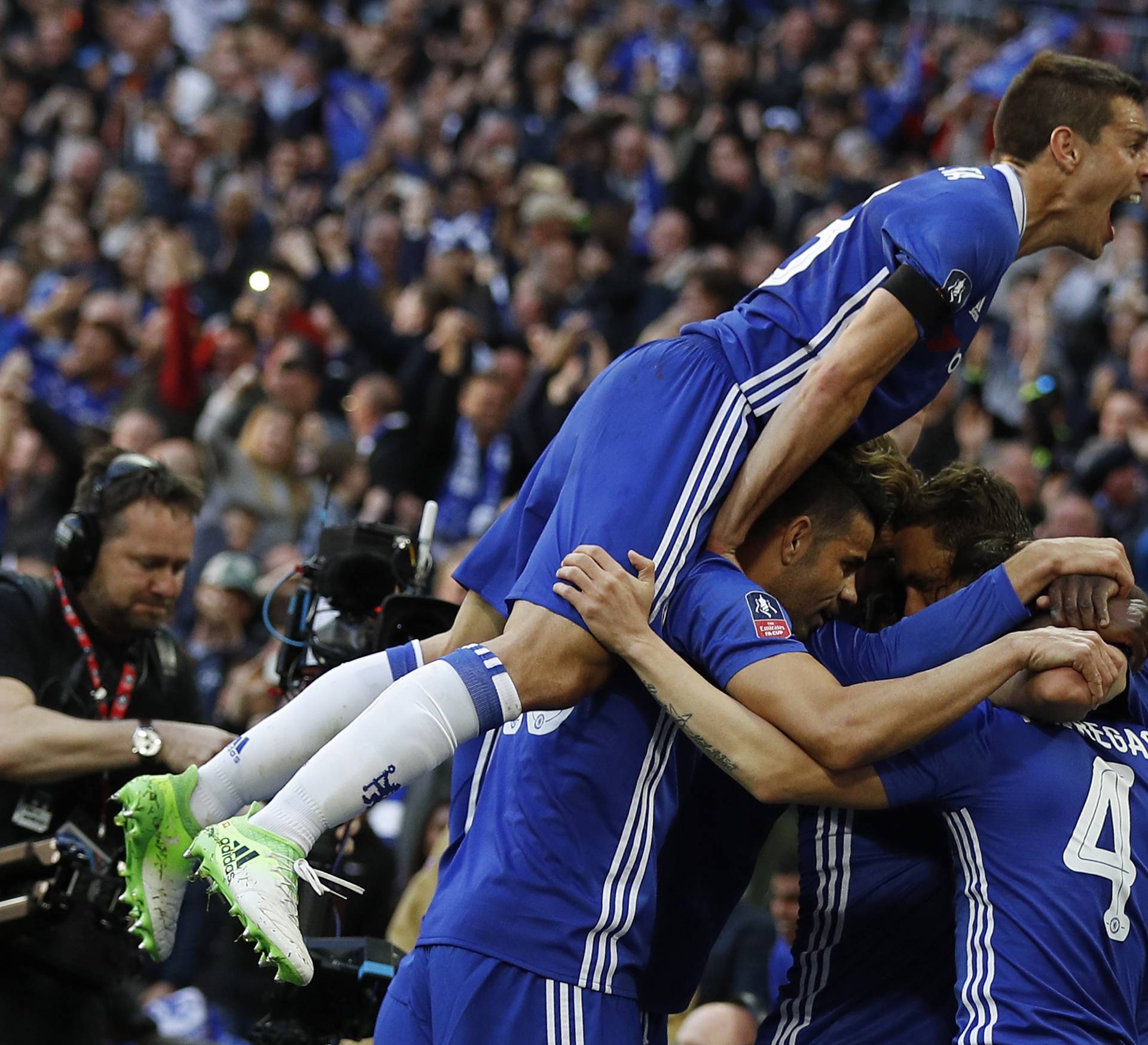 Chelsea's Nemanja Matic celebrates scoring their fourth goal with team mates