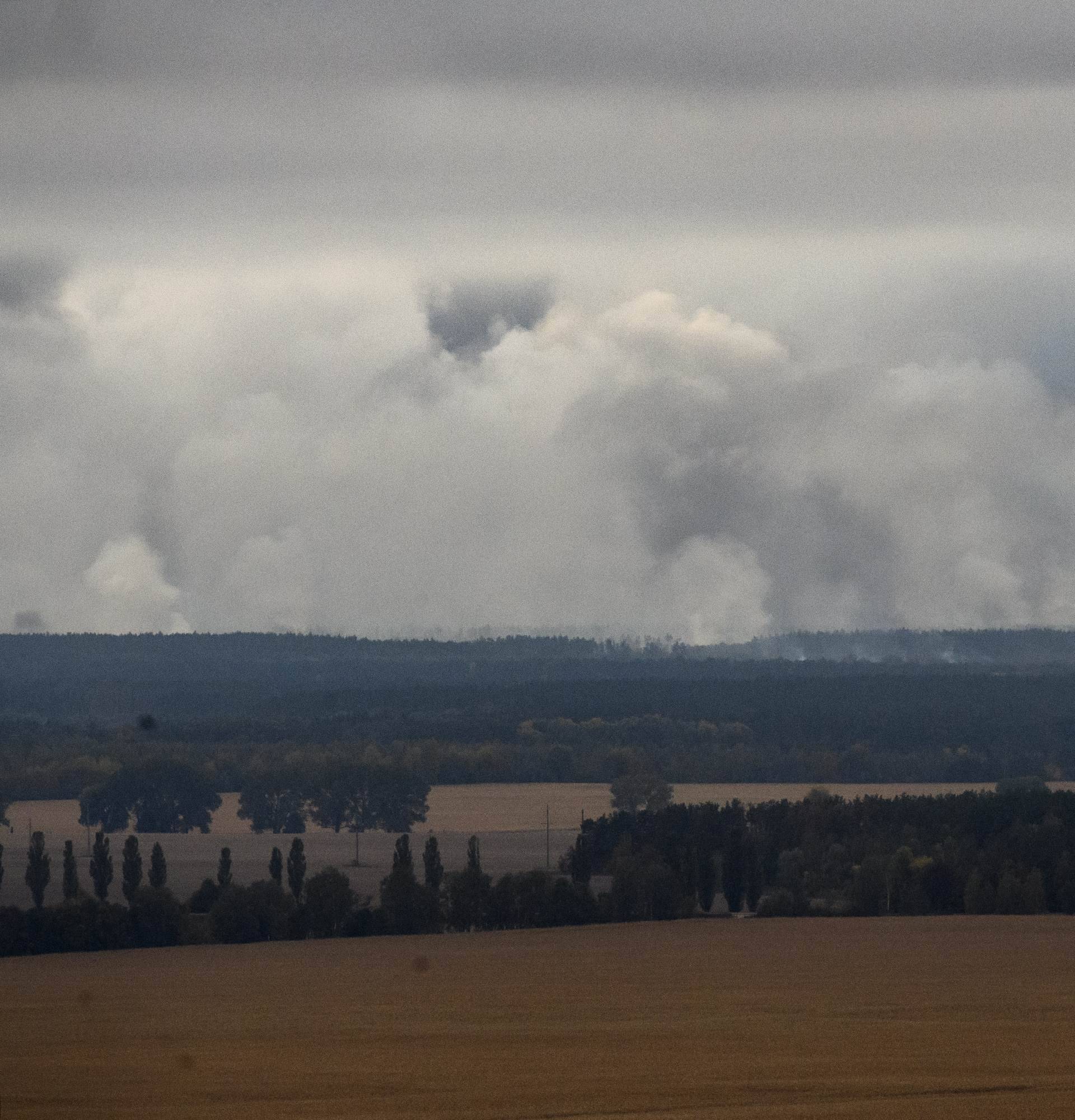Smoke rises after a fire and explosions hit the Ukrainian defence ministry ammunition depot in the eastern Chernigov region