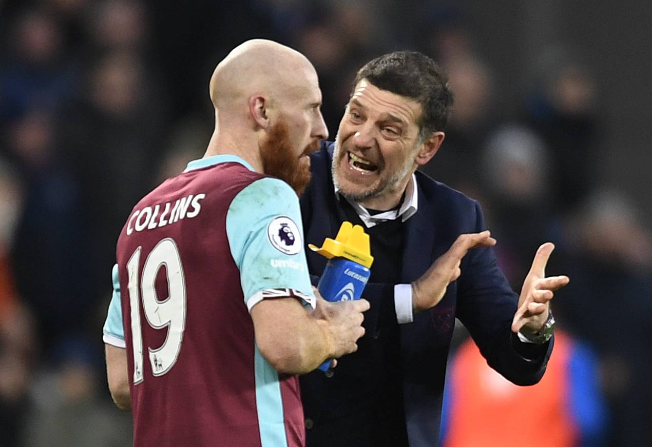 West Ham United's James Collins speaks with manager Slaven Bilic